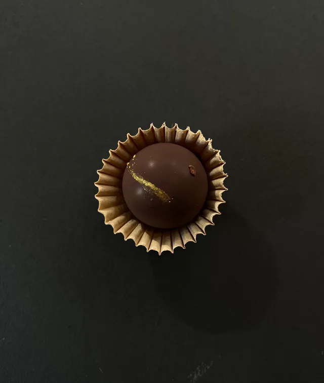 Winter chocolate gift box with four truffles